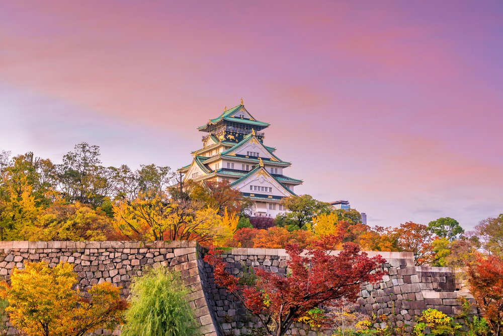 Go on a picnic surrounded by golden and red ginkgo trees in the Osaka Castle grounds