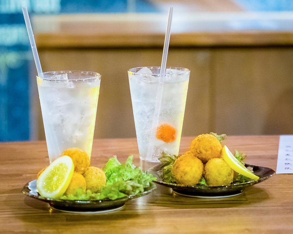 Visit local bars in Tokyo and try unique food pairings!