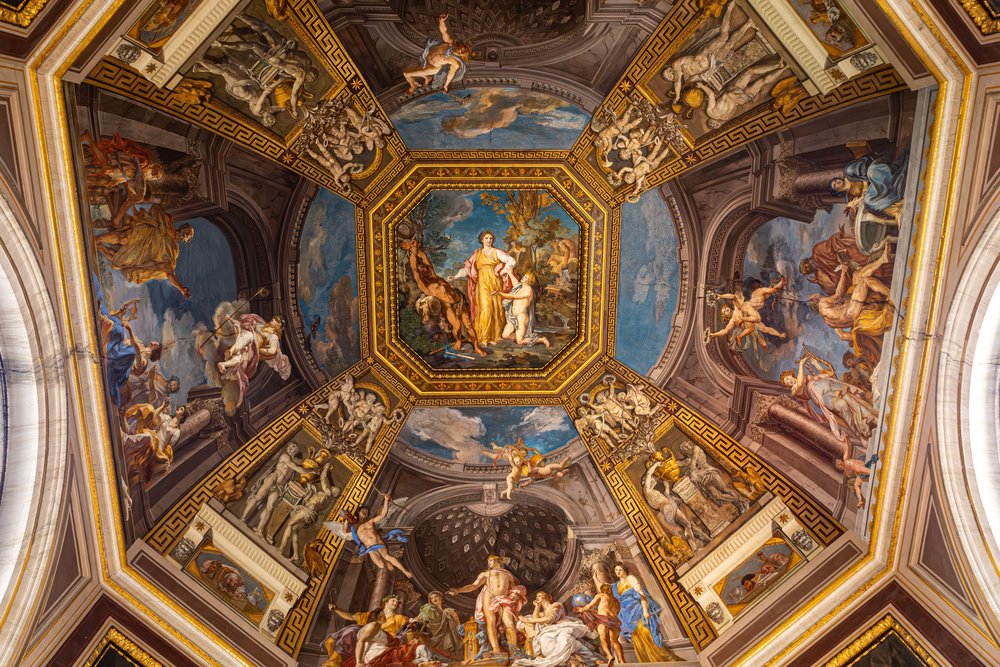 Intricate ceiling frescoes depicting classical scenes from the Vatican Museums | Photo Credit: Regan Dsouza on Pexels