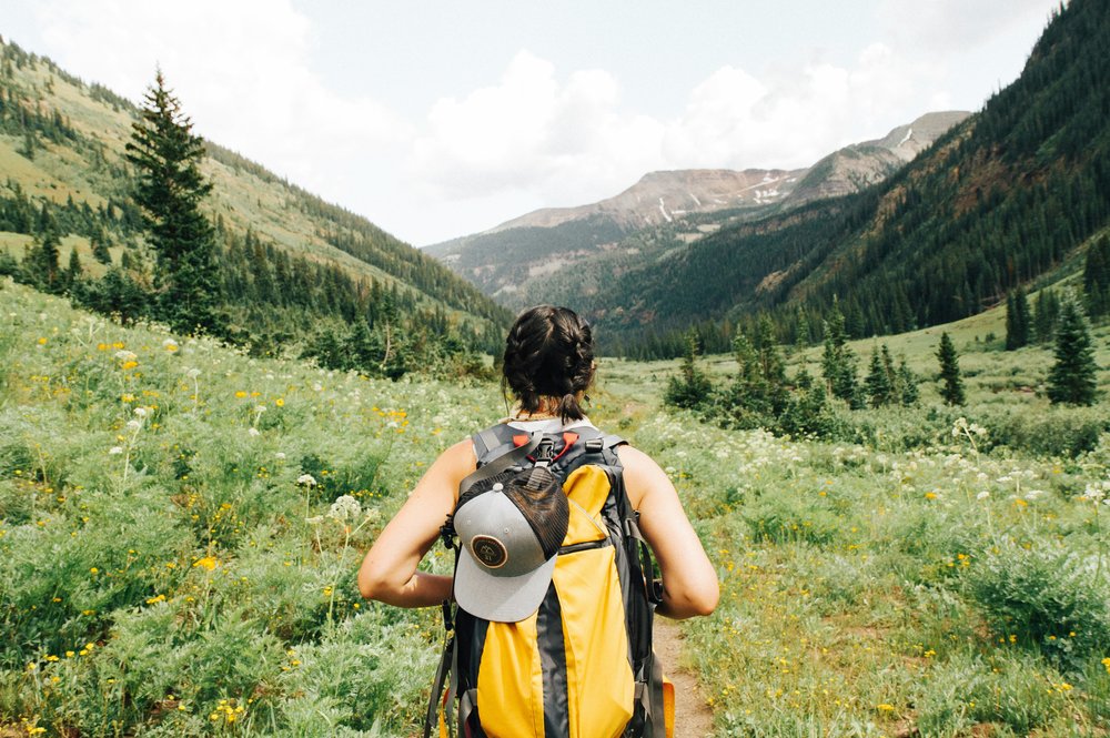 Hiker in New Zealand | Photo Credit: Holly Mandarich on Unsplash