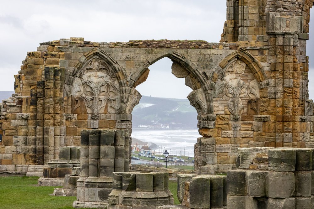 The Whitby Abbey ruins with view of the coastline | Photo by Igor Passchier on Pexels
