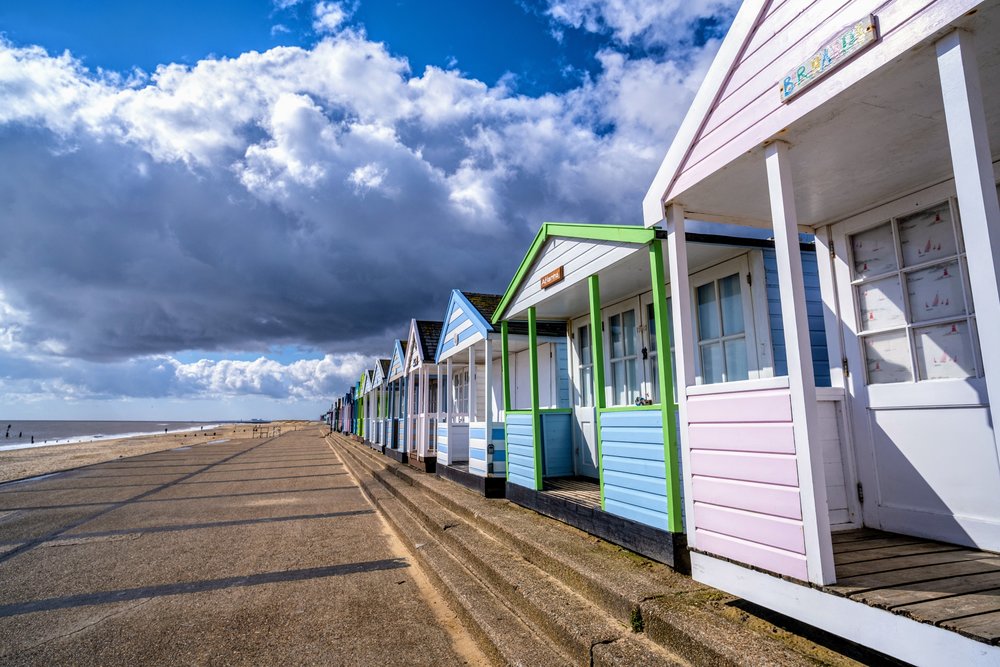 The pastel-colored beach huts in Southwold | Photo by Rob Mowe on Pexels