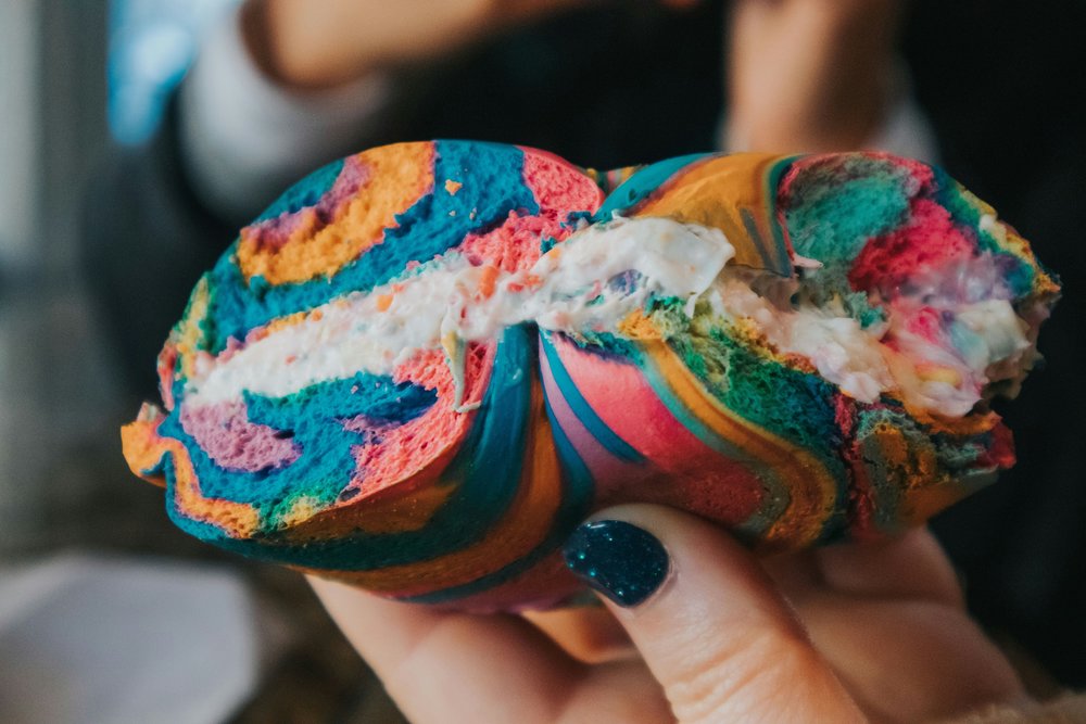 Rainbow bagel | Photo by Caitlyn Wilson on Unsplash 