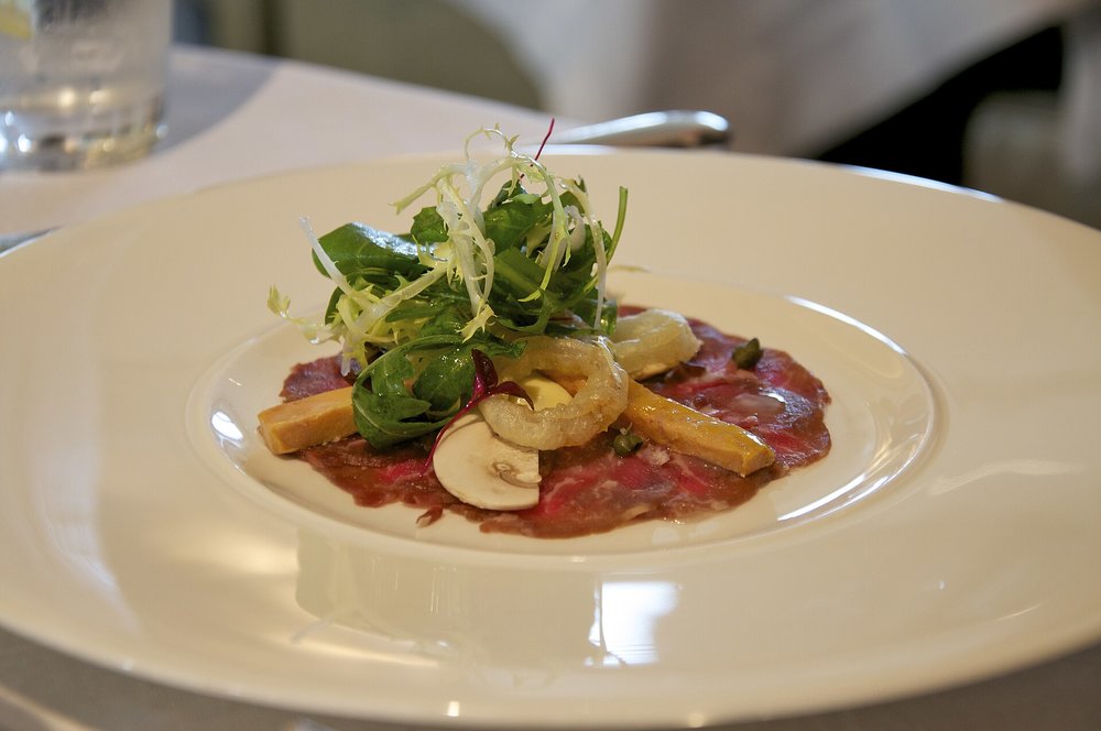 Beef carpaccio served at Restaurant Gordon Ramsay | Photo Credits: Nick Webb on Wikimedia