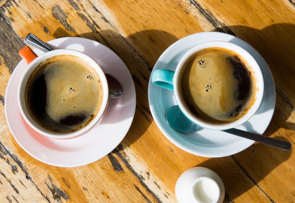 Two cups of hot coffee | Photo by Elle Hughes on Pexels