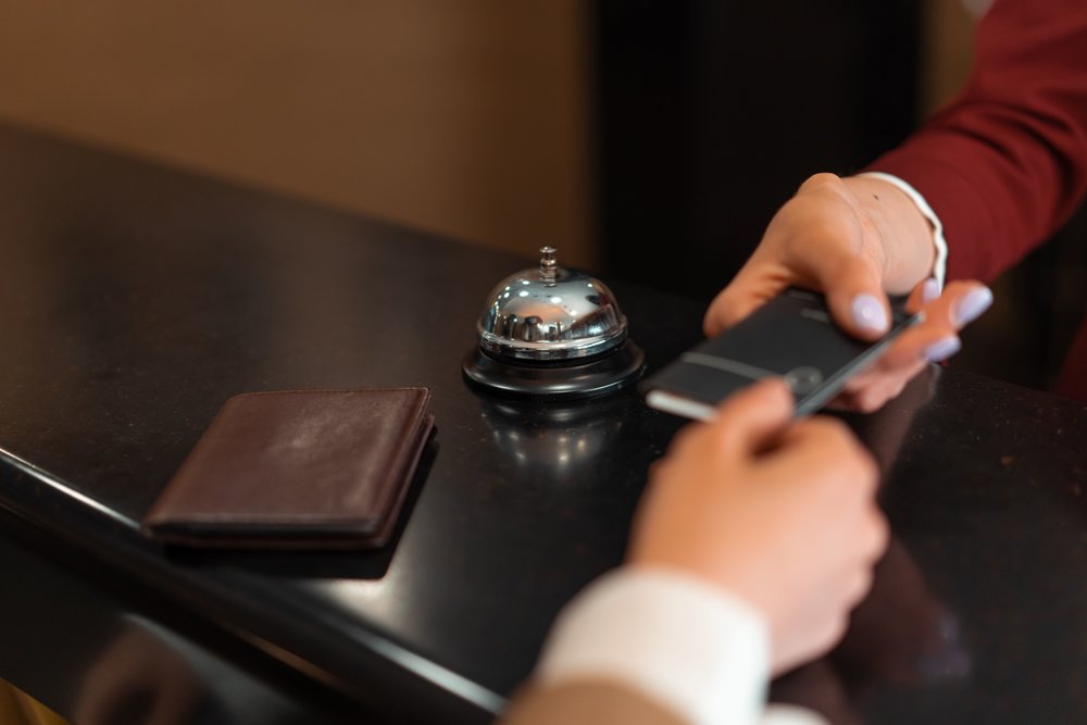 Easy hotel check-in process | Photo Credits: Mikhail Nilov on Pexels