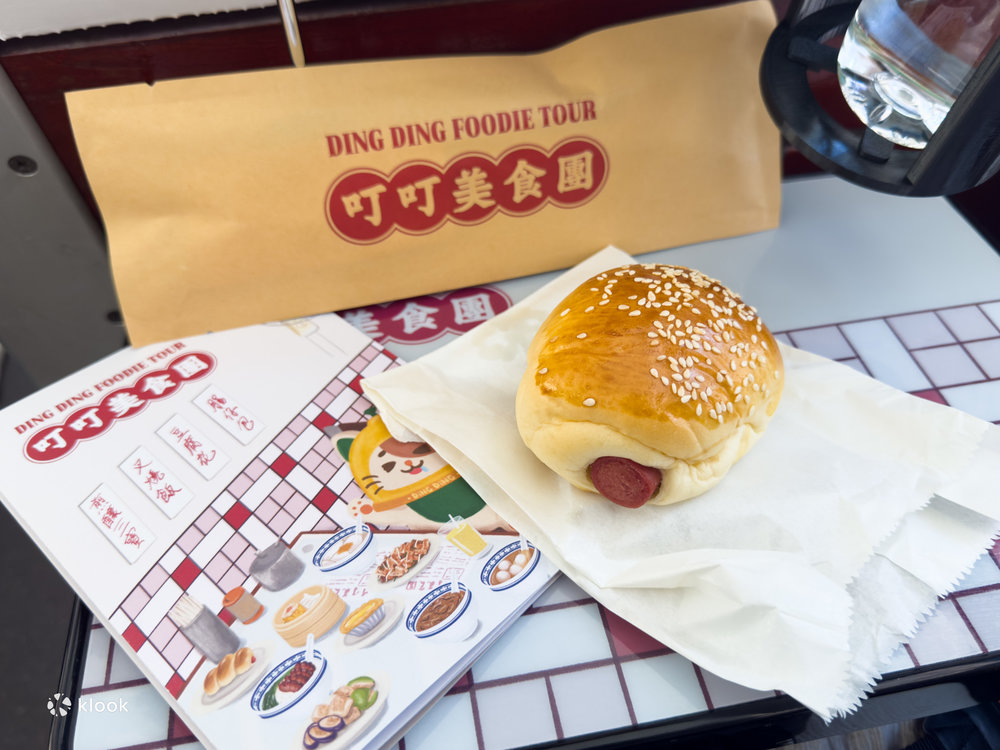 ding ding foodie tour with food and tour pamphlet