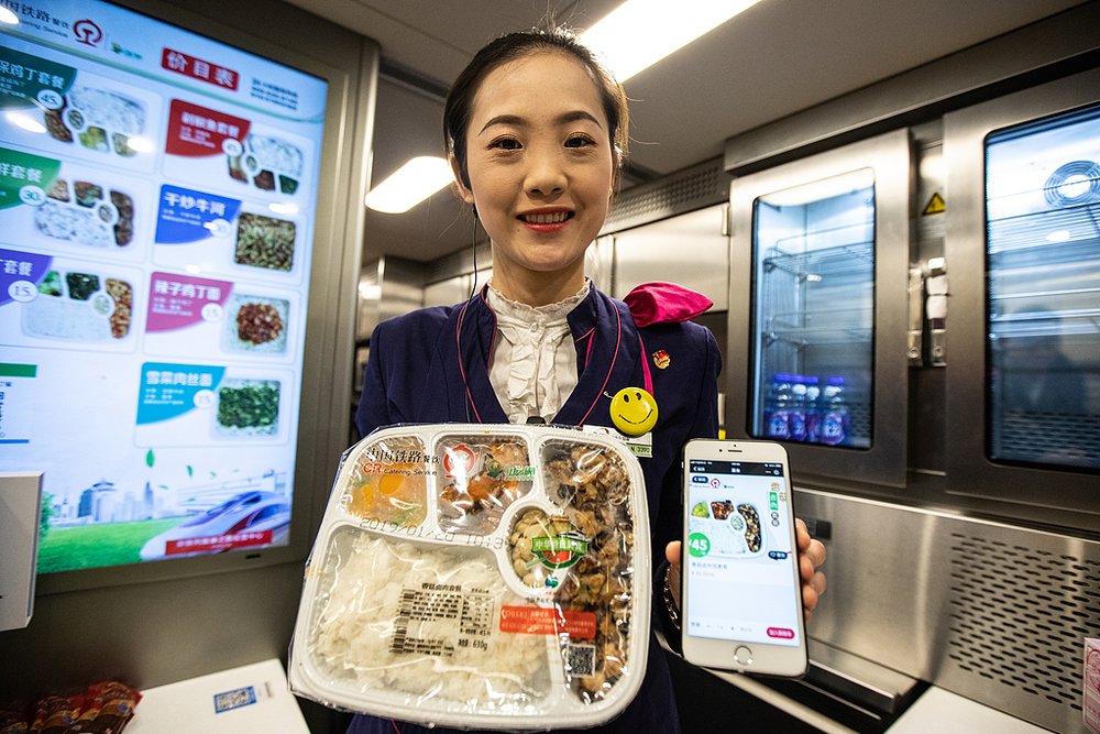 food delivery photo of personnel and phone app
