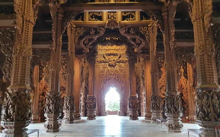 Four cultures in one structure — Explore wings dedicated to Thai, Khmer, Chinese and Indian religious iconography, each covered in intricate carvings.