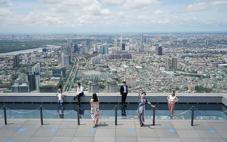 Walk the world's largest glass tray — Step onto the 78th-floor rooftop Glass Tray and look straight down at the city far below.
