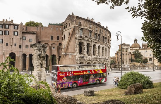  Hop on hop off Rome bus driving past ancient landmarks