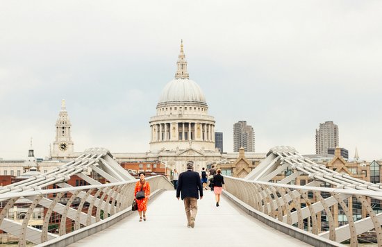 People walking in Millennium Bridge in London | Photo Credit: Yulia Chinato on Unsplash