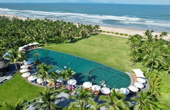 Oceanfront infinity pool at Bliss Hoi An Beach Resort & Wellness
