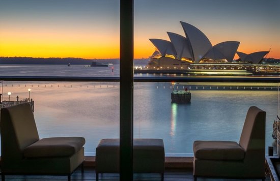 A room with Sydney Opera House in the background