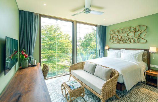 Luxury room with garden view at Hotel CHiEM Hoi An