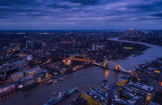 Tower Bridge and Thames skyline at dusk with glowing London city lights | Photo from Pixabay on Pexels