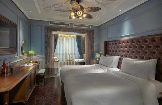 Chic twin room at Peridot Grand Luxury Boutique Hotel