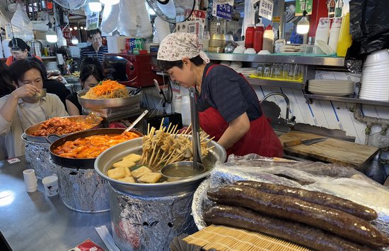 Korean fish cake skewers and tteokbokki at a Seoul street food stall