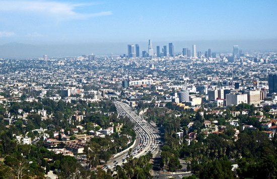 Mulholland Drive scenic view overlooking Los Angeles skyline and highways