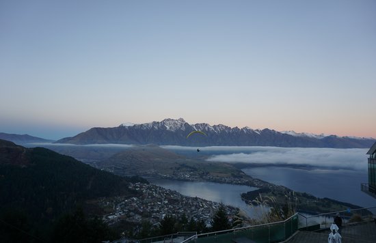 Paragliding over Queenstown with stunning Lake Wakatipu and Southern Alps views
