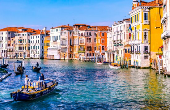 A gondola cruising along the Grand Canal at Venice