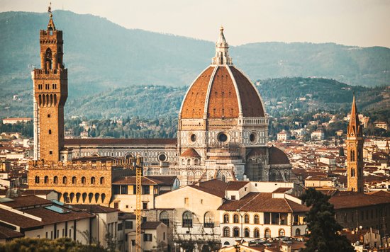 Panoramic view of Florence featuring the Duomo dome and terracotta rooftops