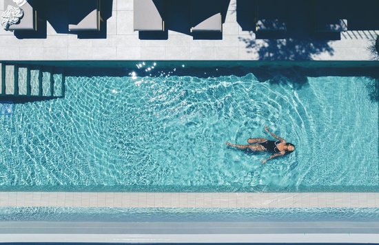 A woman swimming in a pool