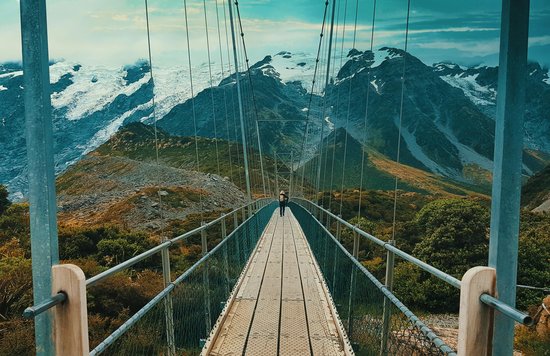 Crossing the Hooker Valley suspension bridge in Aoraki