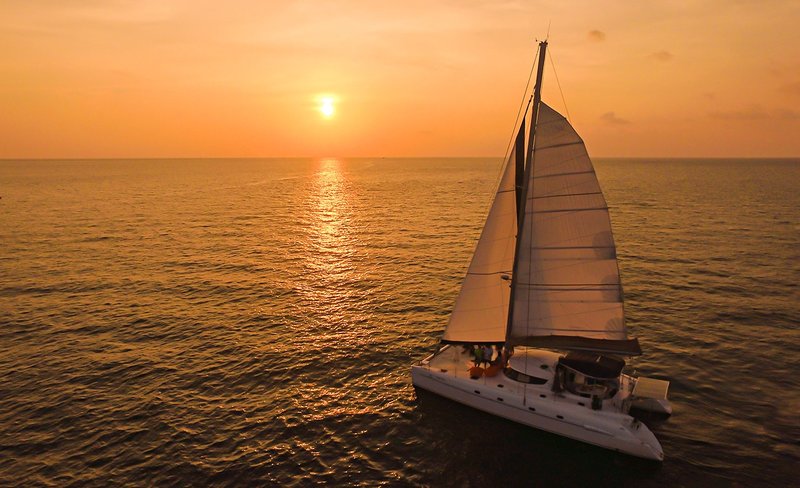 Promthep Cape and Nui Beach Sunset Catamaran Tour with Dinner from Phuket
