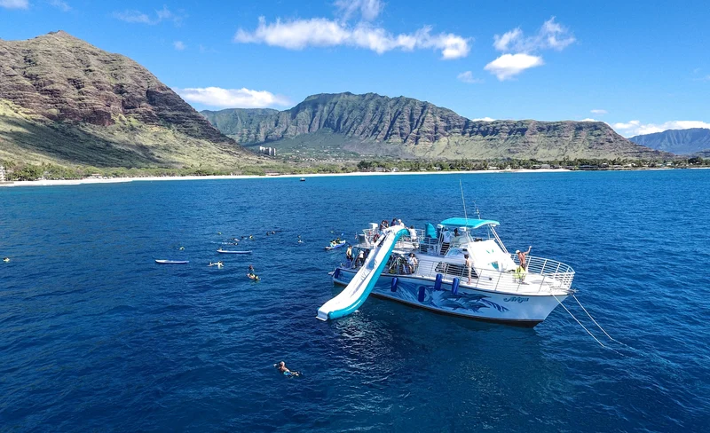 Oahu Dolphin Cruise with Water Activities, Pickup & Lunch Included
