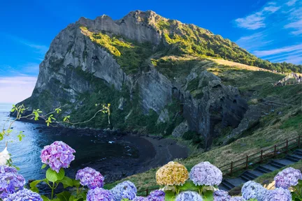 济州东部旅行:海女、城山日出峰、洞穴之旅