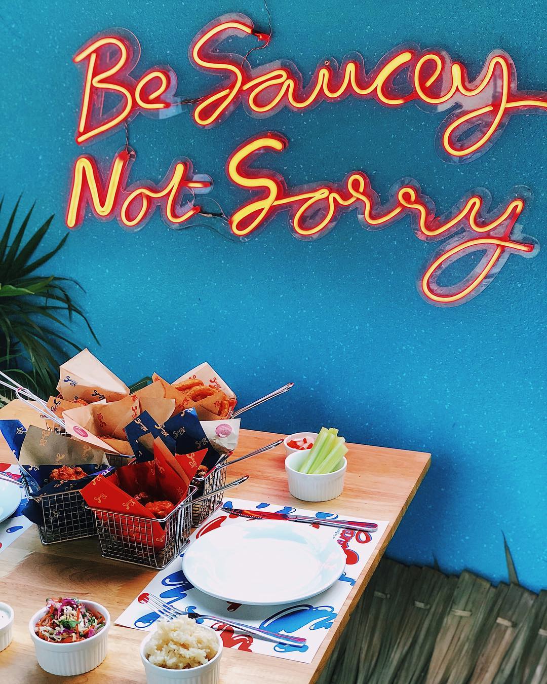 Saucey Chicken and Beer Bomb neon sign