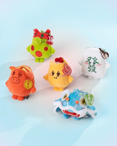 one randomly selected keychain design out of five characters — Lap Sap Chung, Lion Dance, Shumai, Piggy Bank, and Mahjong