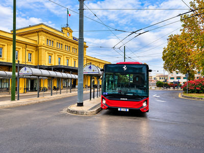 Ferrari Museum shuttle bus at Modena Train Station, bus stop No. 4, offering transfers to the Ferrari Museums in Maranello and Modena, Italy.