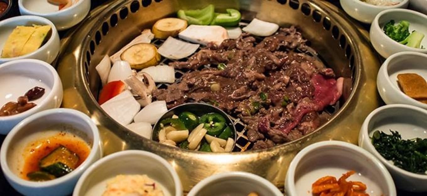korean bbq barbecue with full side dishes korea food shutterstock 193919228