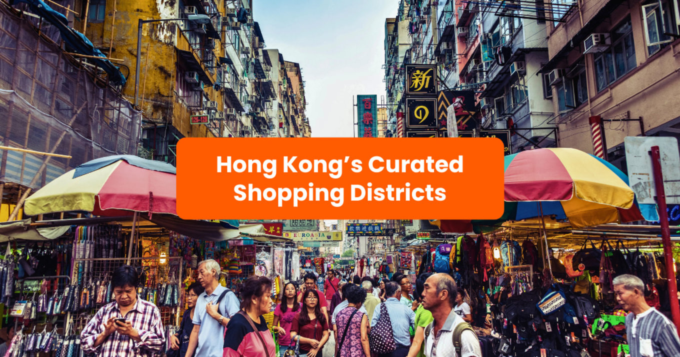 People walking along the streets of Hong Kong packed with stalls