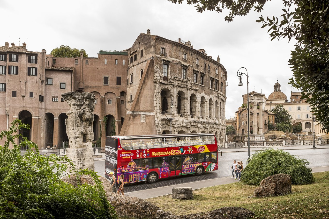  Hop on hop off Rome bus driving past ancient landmarks