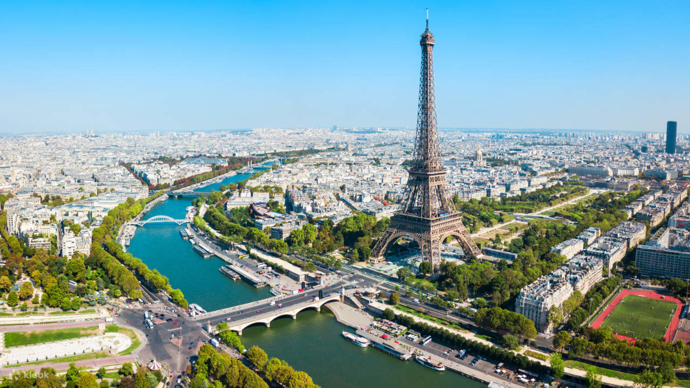 The facade of Paris with the Eiffel Tower standing tall