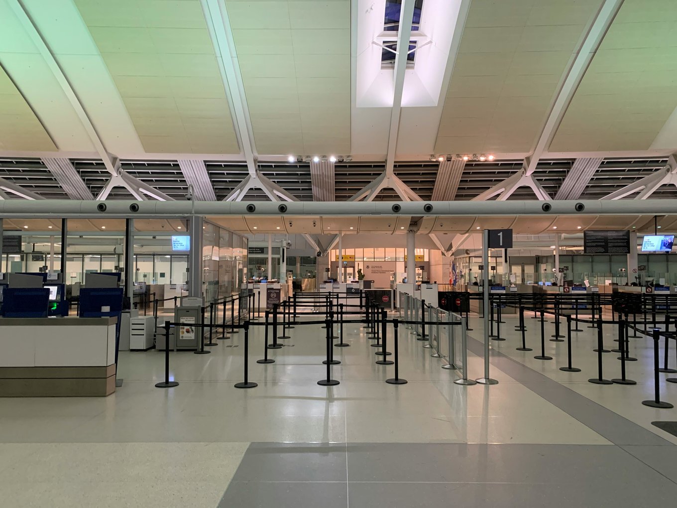 Airport security checkpoint with clear lanes showing a calm and quiet travel terminal | Photo from Brian James on Pexels