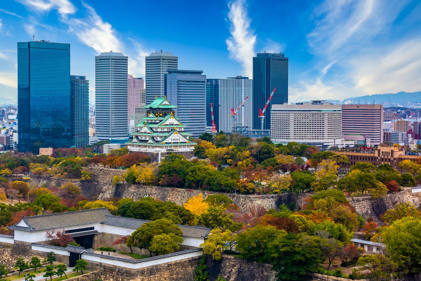 Osaka Castle with city skyline, a landmark near popular places to stay in Osaka