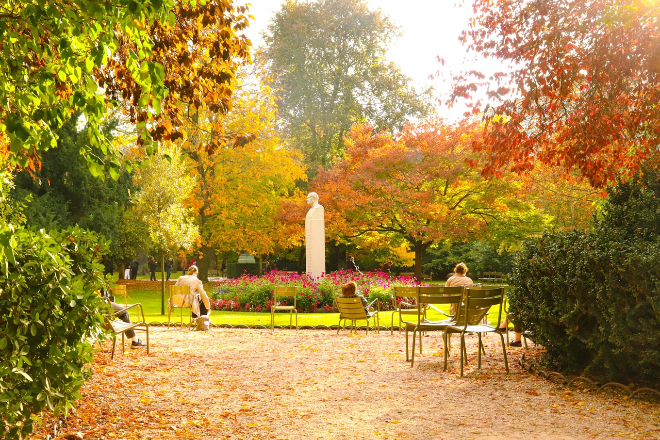  Autumn day in a serene park with statue | Photo Credit: Céline | on Pexels
