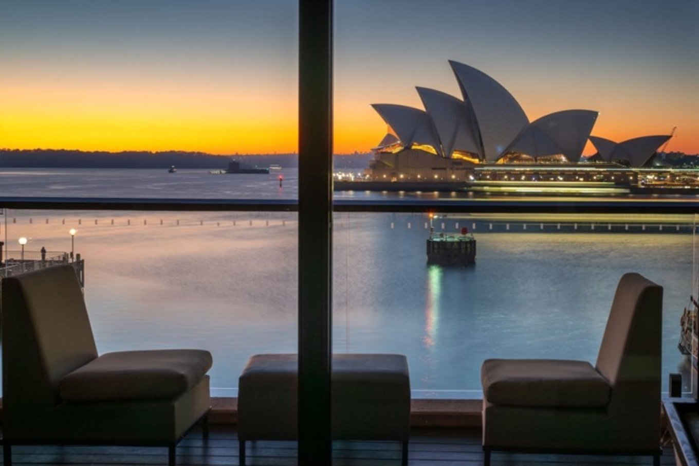 A room with Sydney Opera House in the background