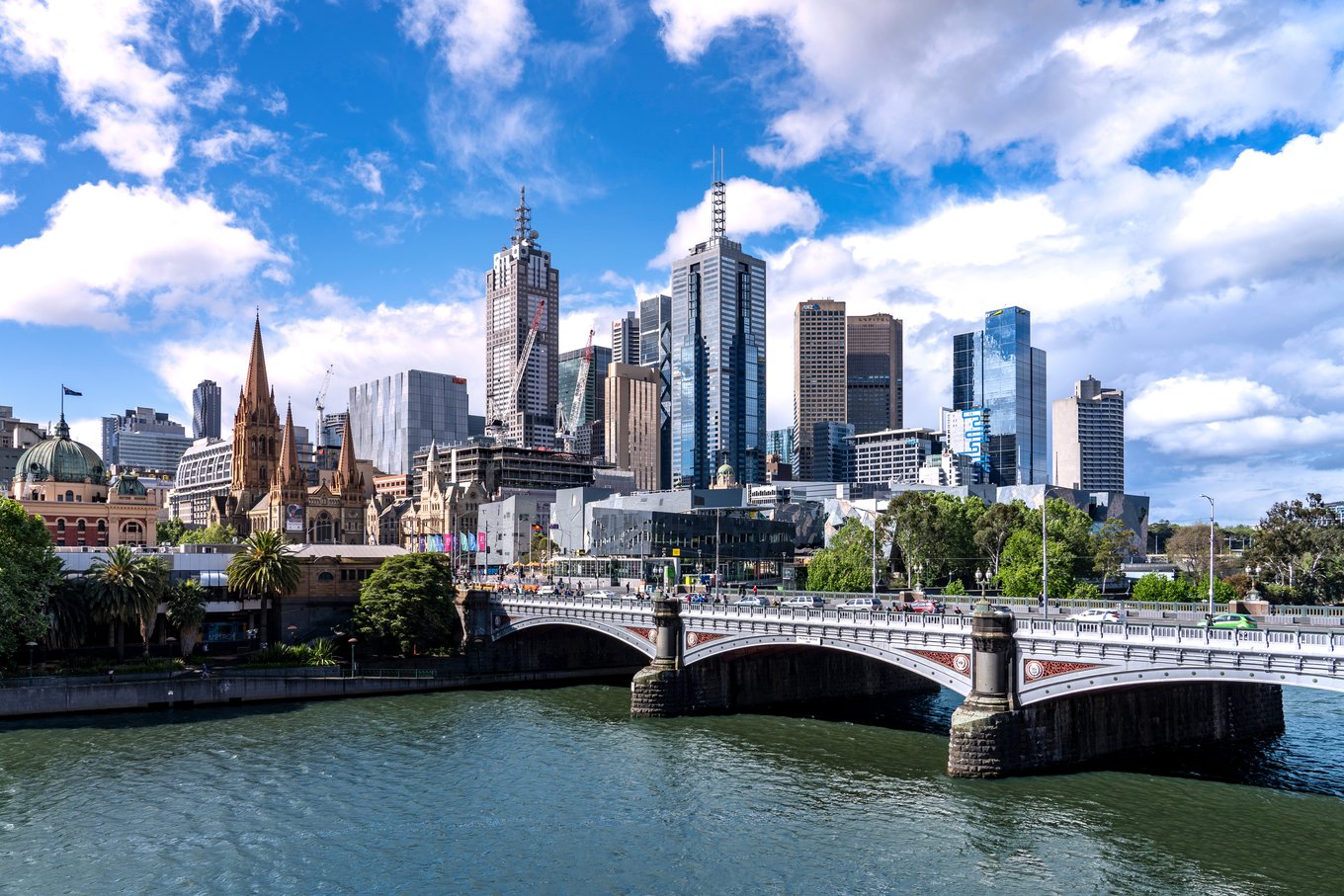 Melbourne city skyline with Yarra River and Princes Bridge on a sunny day