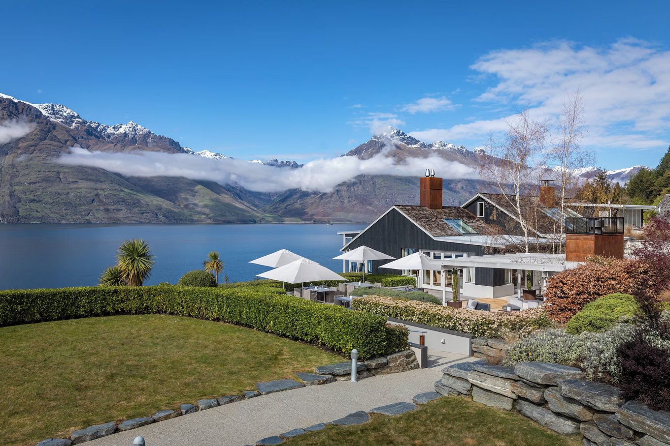 Panoramic view of mountains and lake from a luxury resort in New Zealand