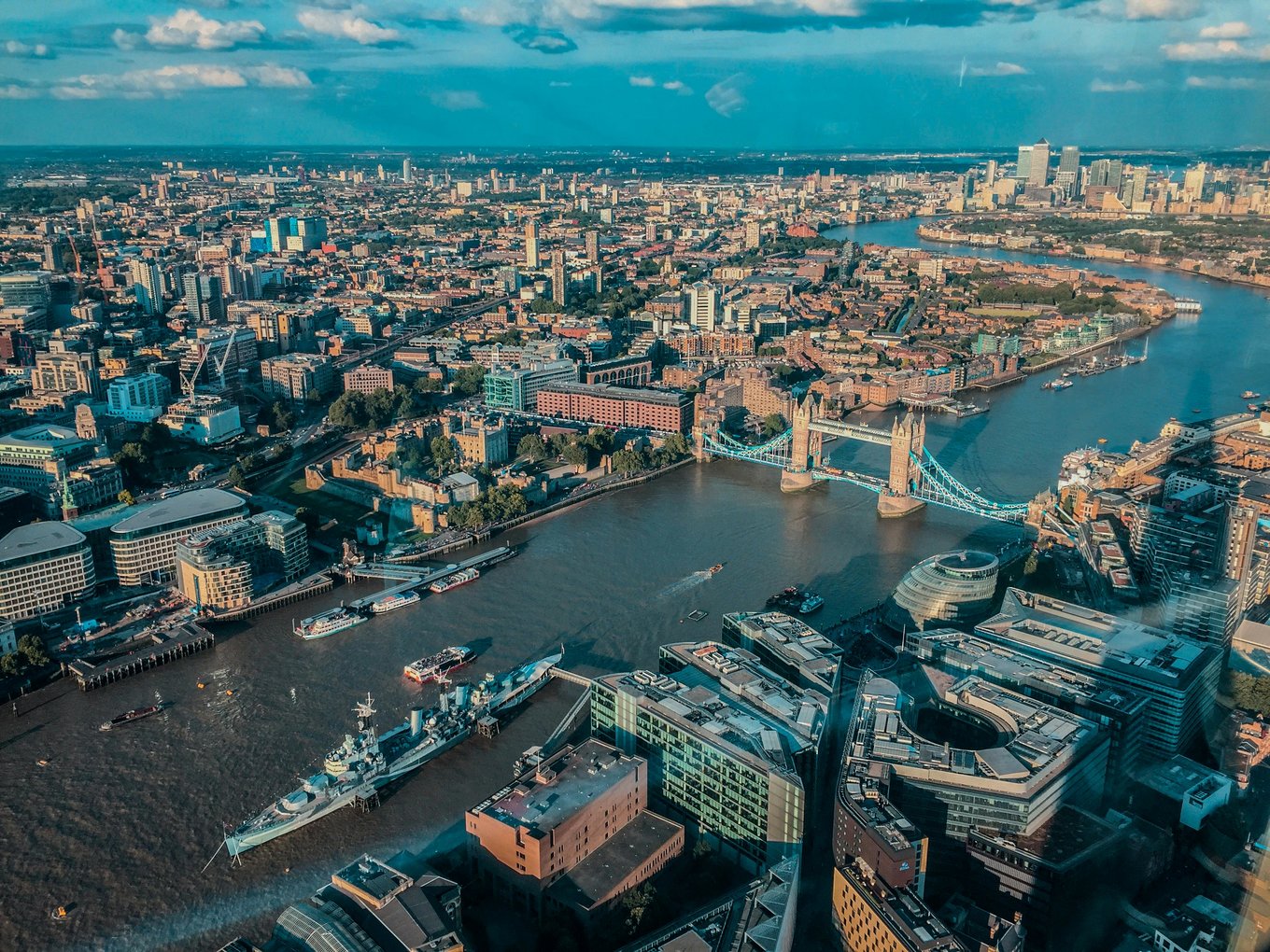 Aerial view of London, featuring Tower Bridge and the River Thames