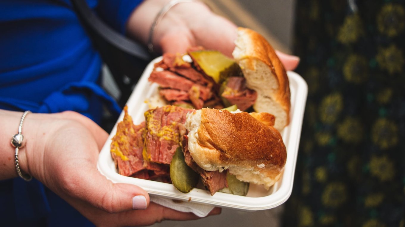 Salt beef bagel sandwich with mustard and pickles