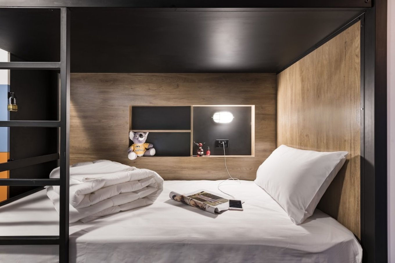 Private pod bed with charging outlet at Hostel G Perth Australia