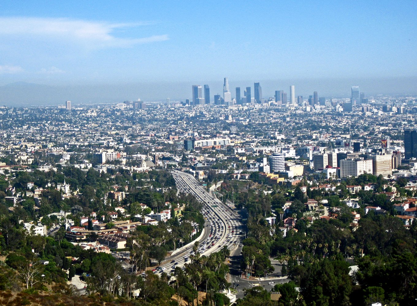 Mulholland Drive scenic view overlooking Los Angeles skyline and highways