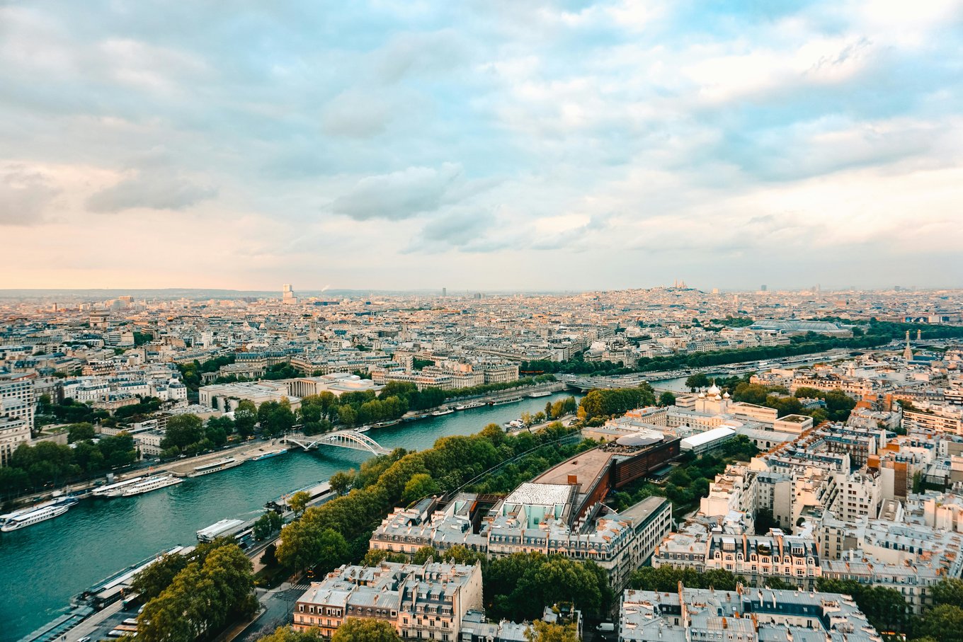 Panoramic views of Paris and the Seine River.