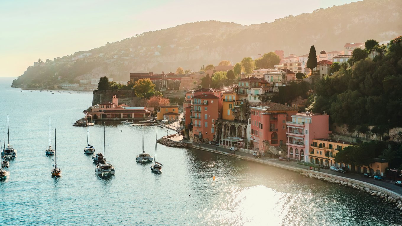 Boats along the harbor in Villefranche-sur-Mer | Photo Credit: Antoine Contenseau on Unsplash